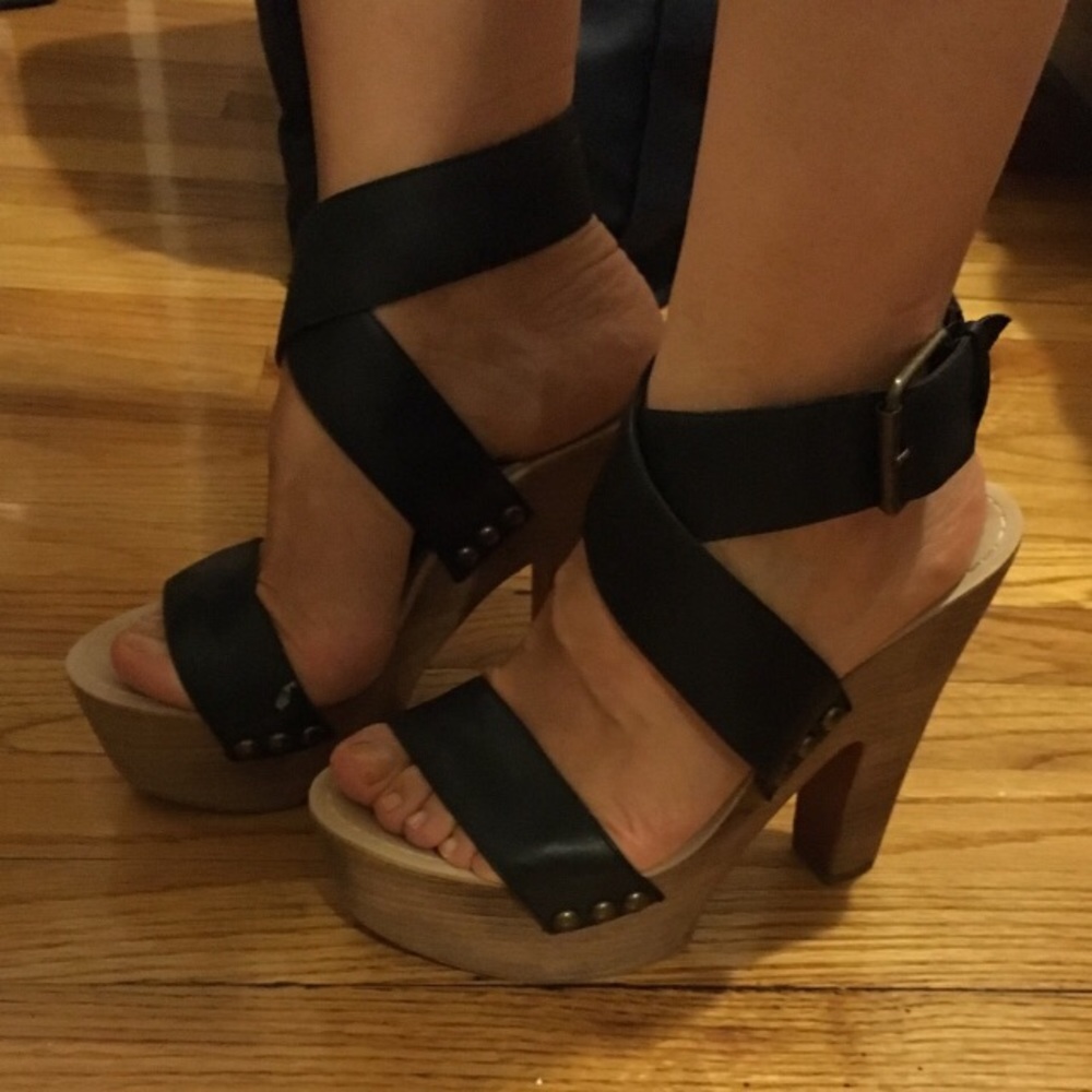 Tan strappy platform heels.